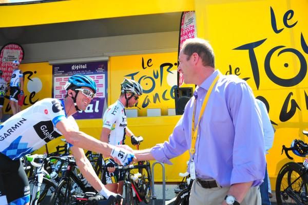 Christian Prudhomme greets David Millar (Garmin-Cervelo) in Olonne-sur-Mer.
