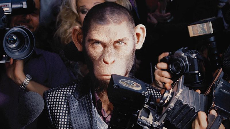 better man movie still of the monkey surrounded by cameras