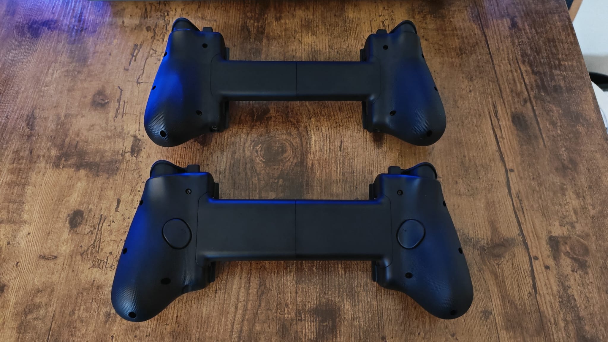 The back of the Razer Kishi V3 Pro compared with the back of the Kishi Ultra