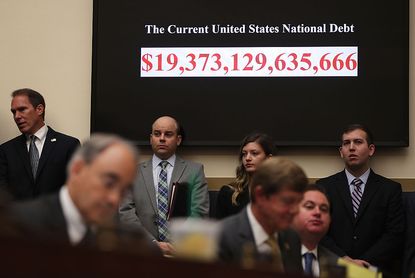 A sign displaying the national debt