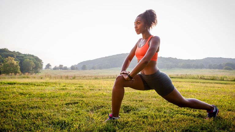What are the benefits of lunges? Image shows woman lunging outside