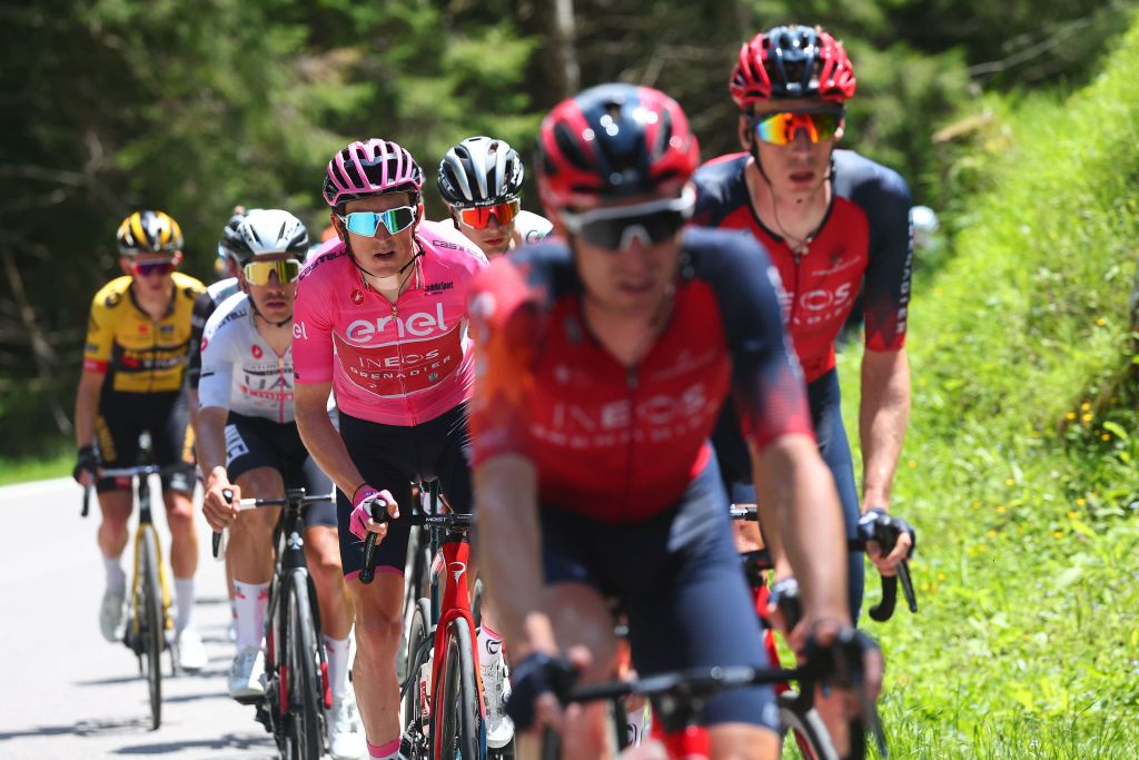 Overall leaders pink jersey INEOS Grenadierss British rider Geraint Thomas C and Best young riders white jersey UAE Team Emiratess Portuguese rider Joao Almeida 2ndL ride in the pack during the eighteenth stage of the Giro dItalia 2023 cycling race 161 km between Oderzo and Val di Zoldo on May 25 2023 Photo by Luca Bettini AFP Photo by LUCA BETTINIAFP via Getty Images