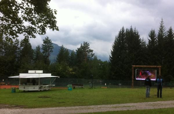 Spectators will be able to grab a beer from the vendor on the left and hang out and watch the action on the jumbotron