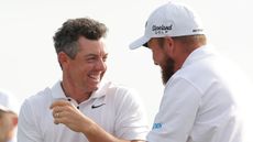 Rory McIlroy and Shane Lowry celebrate victory at the Zurich Classic of New Orleans