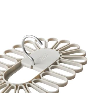 Joseph Joseph beige petal hanger with silver hanger