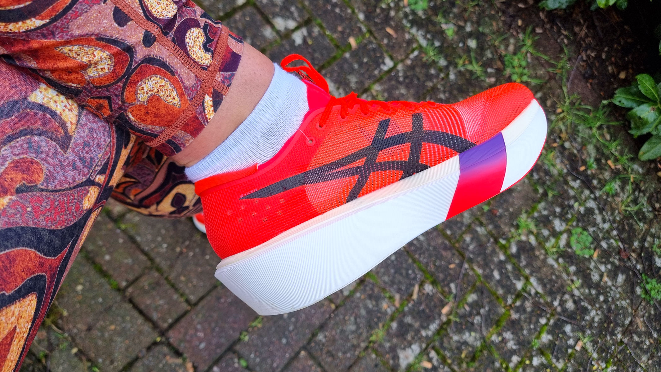 A picture of our reviewer's Asics Metaspeed Sky Tokyo running shoes