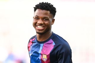 Liverpool target Ansu Fati while warming up for Barcelona 