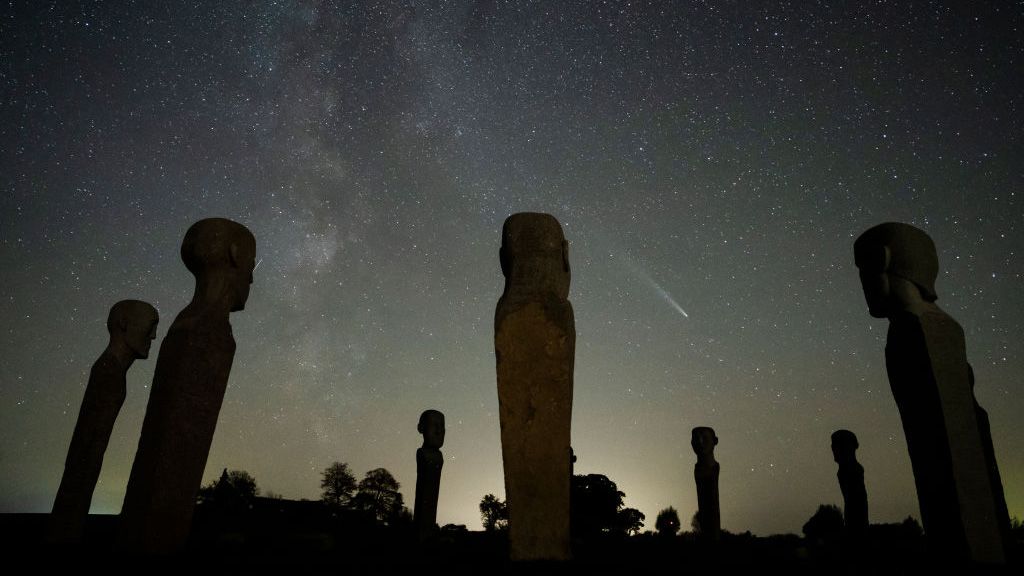 Comet C/2023 A3 - Tsuchinshan-ATLAS is seen in the sky above the artwork Dodekalitten at Lolland southern Zealand, Denmark on October 22, 2024. (Photo by Mads Claus Rasmussen / Ritzau Scanpix / AFP) / Denmark OUT (Photo by MADS CLAUS RASMUSSEN/Ritzau Scanpix/AFP via Getty Images)