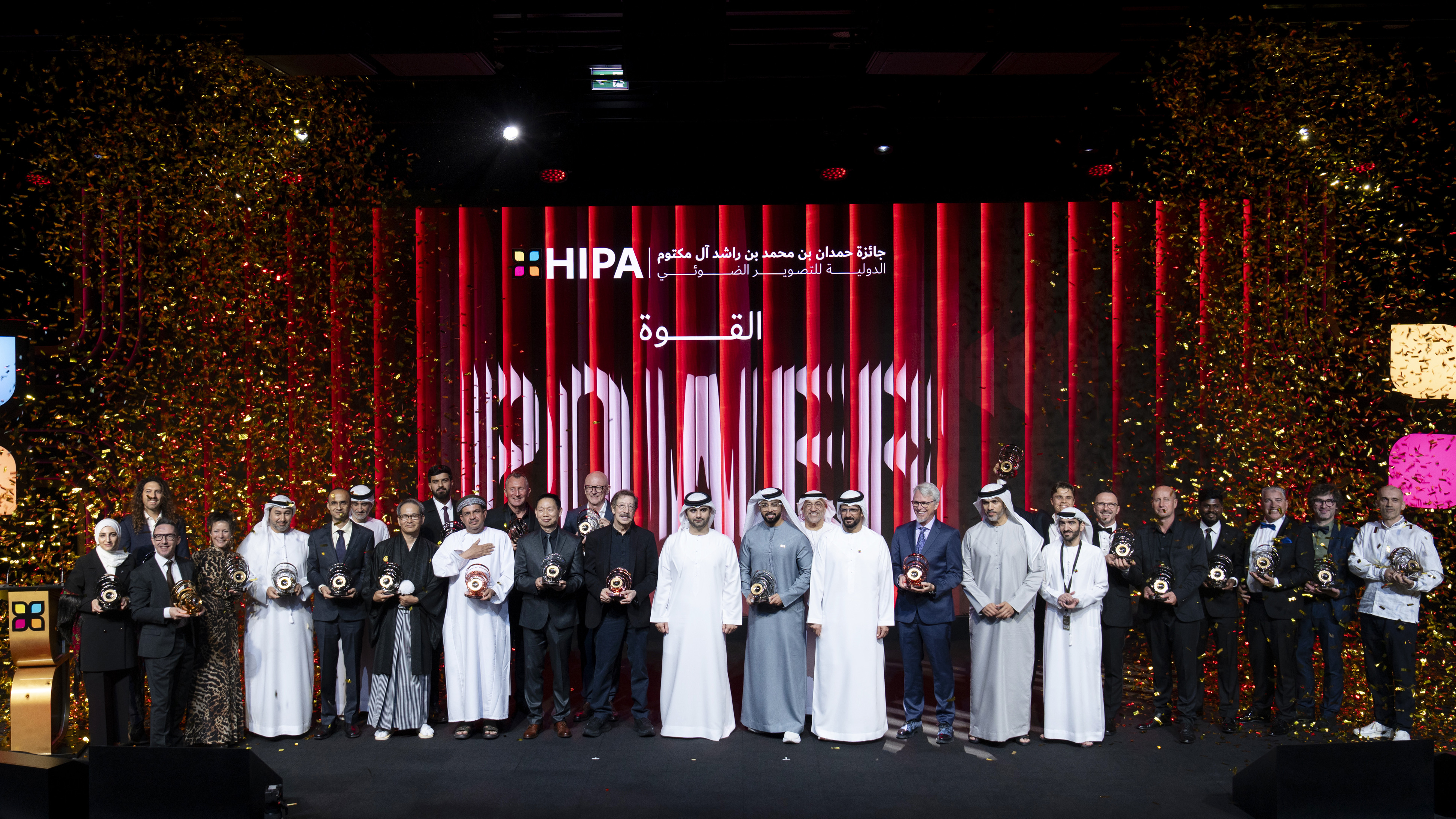 Photo of the winners of the 14th season of HIPA (the Hamdan bin Mohammed bin Rashid Al Maktoum International Photography Award) on stage at the ceremony at the Museum of the Future, Dubai