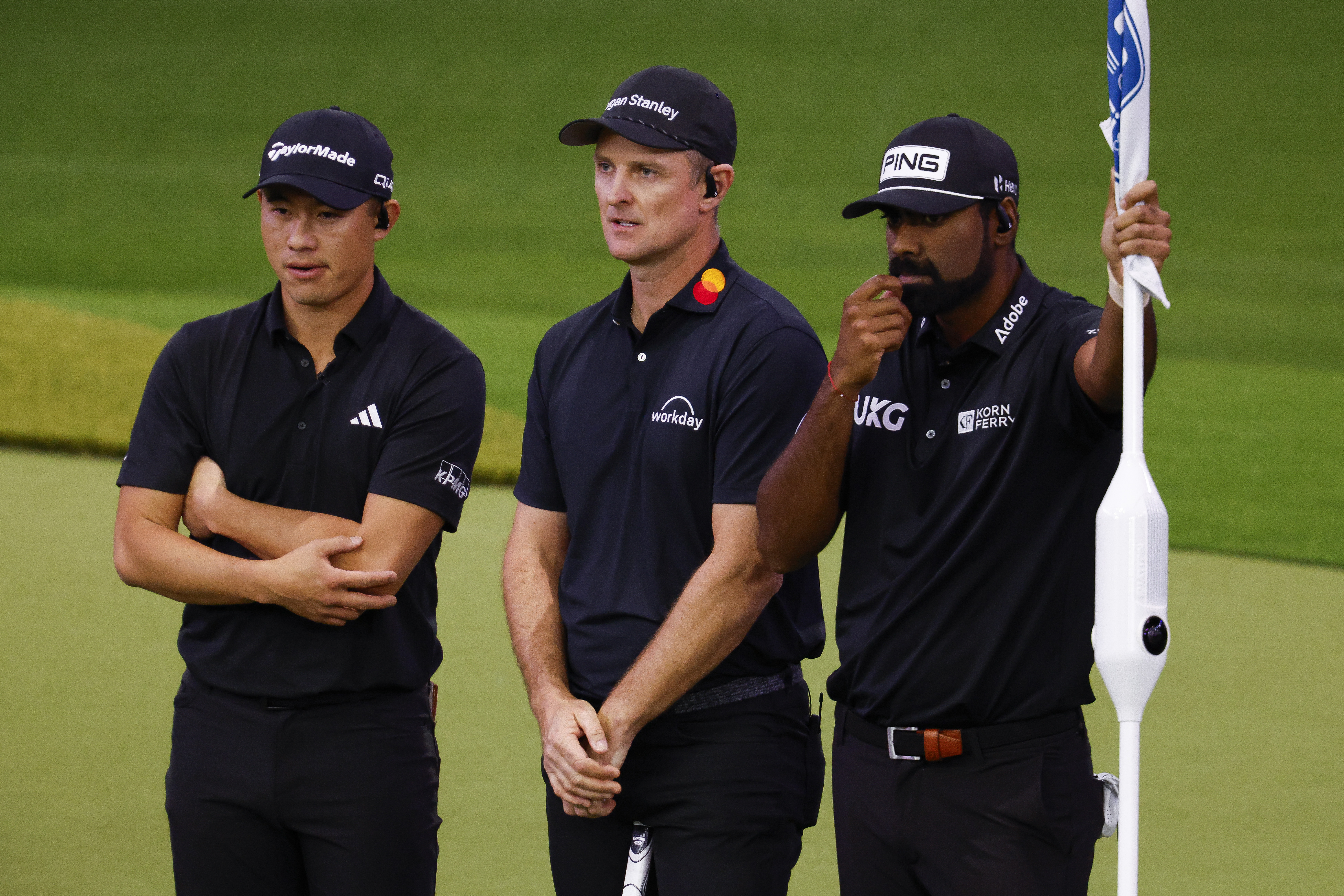 (L to R) Collin Morikawa, Justin Rose and Sahith Theegala look on during a TGL match in 2026