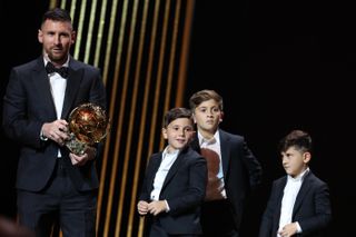 Lionel Messi with sons Thiago, Mateo and Ciro after winning the Ballon d'Or in October 2023.