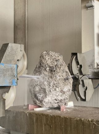 Water jets cutting a stone to create the ‘Dolomite’ chair