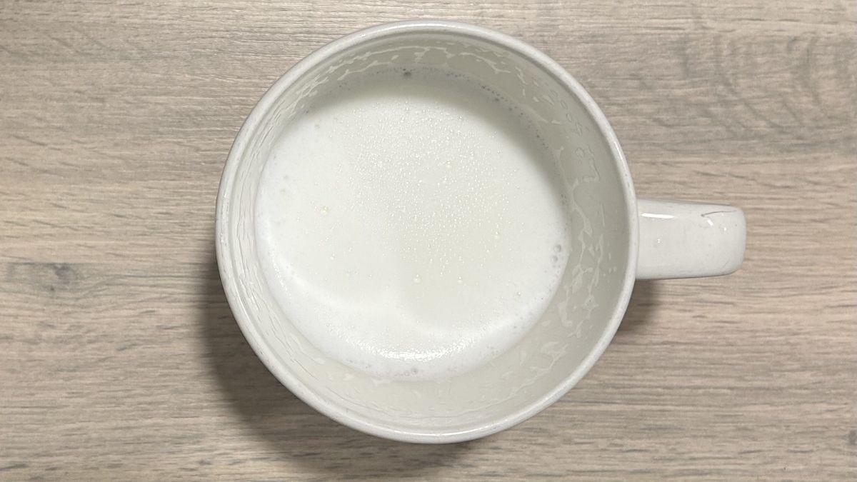 Warm cow's milk after frothing with Subminimal NanoFoamer Lithium.