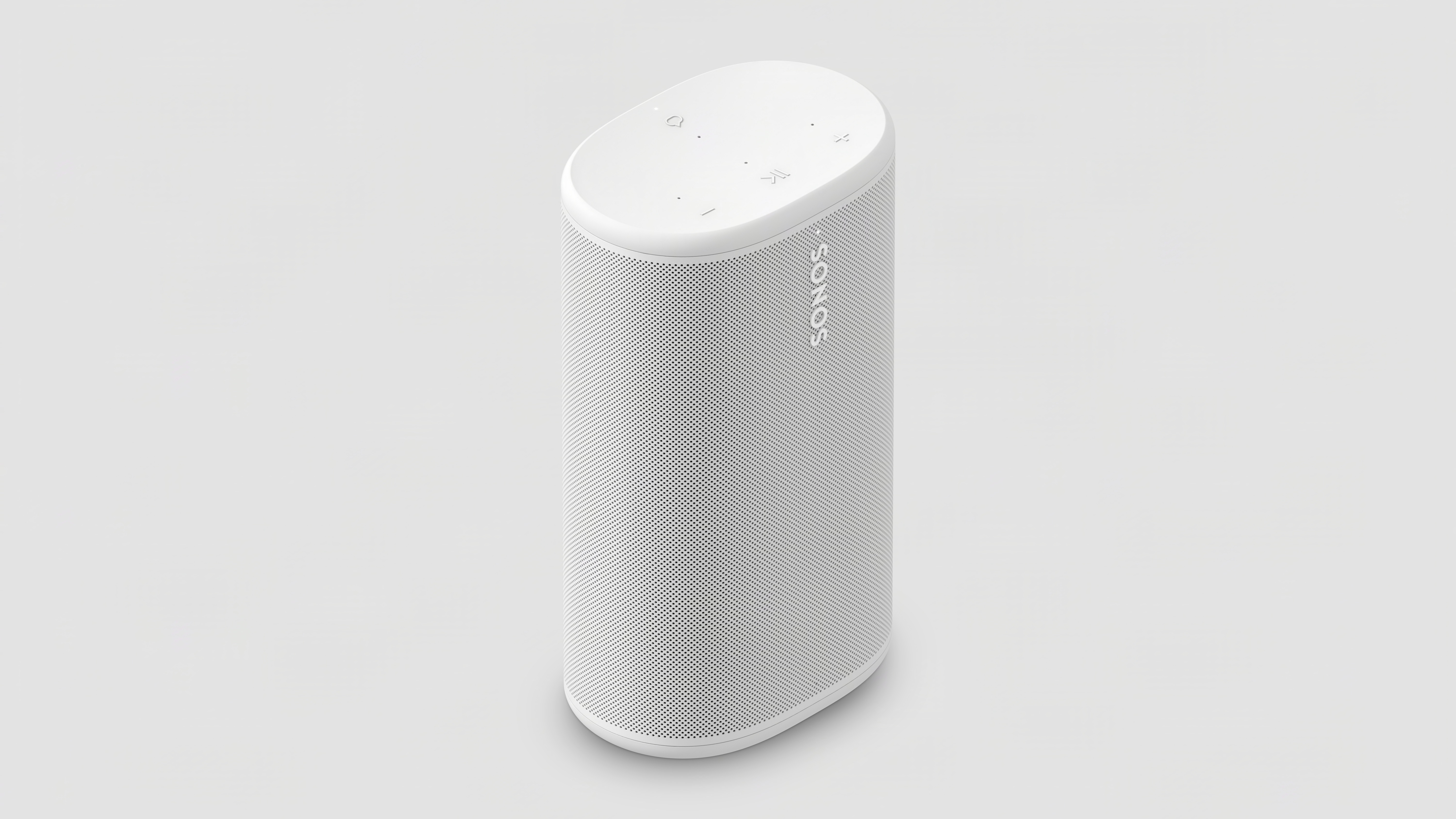 A white Sonos Play speaker at a 3/4 angle on a grey background.