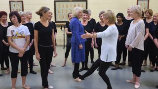 Queen Camilla with Elaine Paige and Angela Rippon as she visits the Royal Academy of Dance
