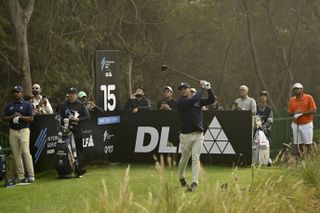 Bryson DeChambeau hits a drive during the 2025 International Series India