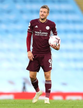 Leicester's Jamie Vardy claims the match ball after his hat-trick at Manchester City