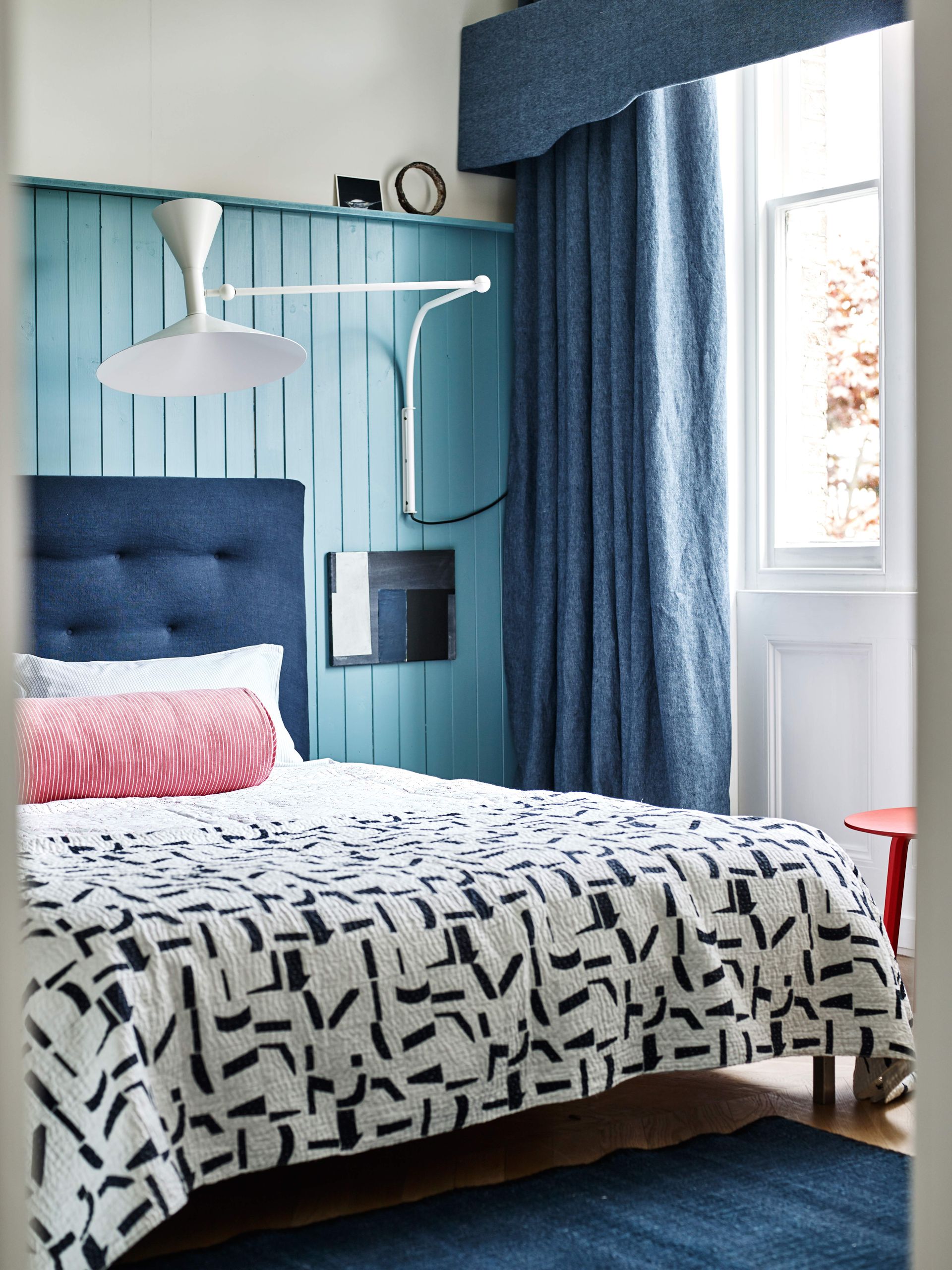 Blue bedroom with panelling