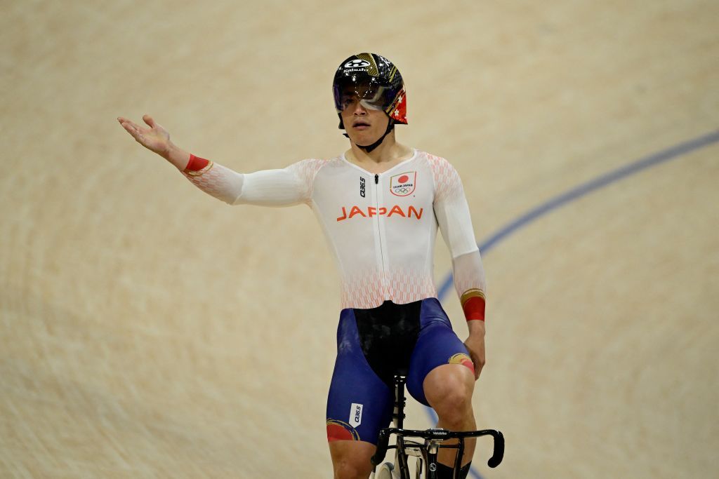 Japan's Kaiya Ota reacts after a men's track cycling sprint quarter-final race 2 of the Paris 2024 Olympic Games at the Saint-Quentin-en-Yvelines National Velodrome in Montigny-le-Bretonneux, south-west of Paris, on August 8, 2024. (Photo by John MACDOUGALL / AFP)
