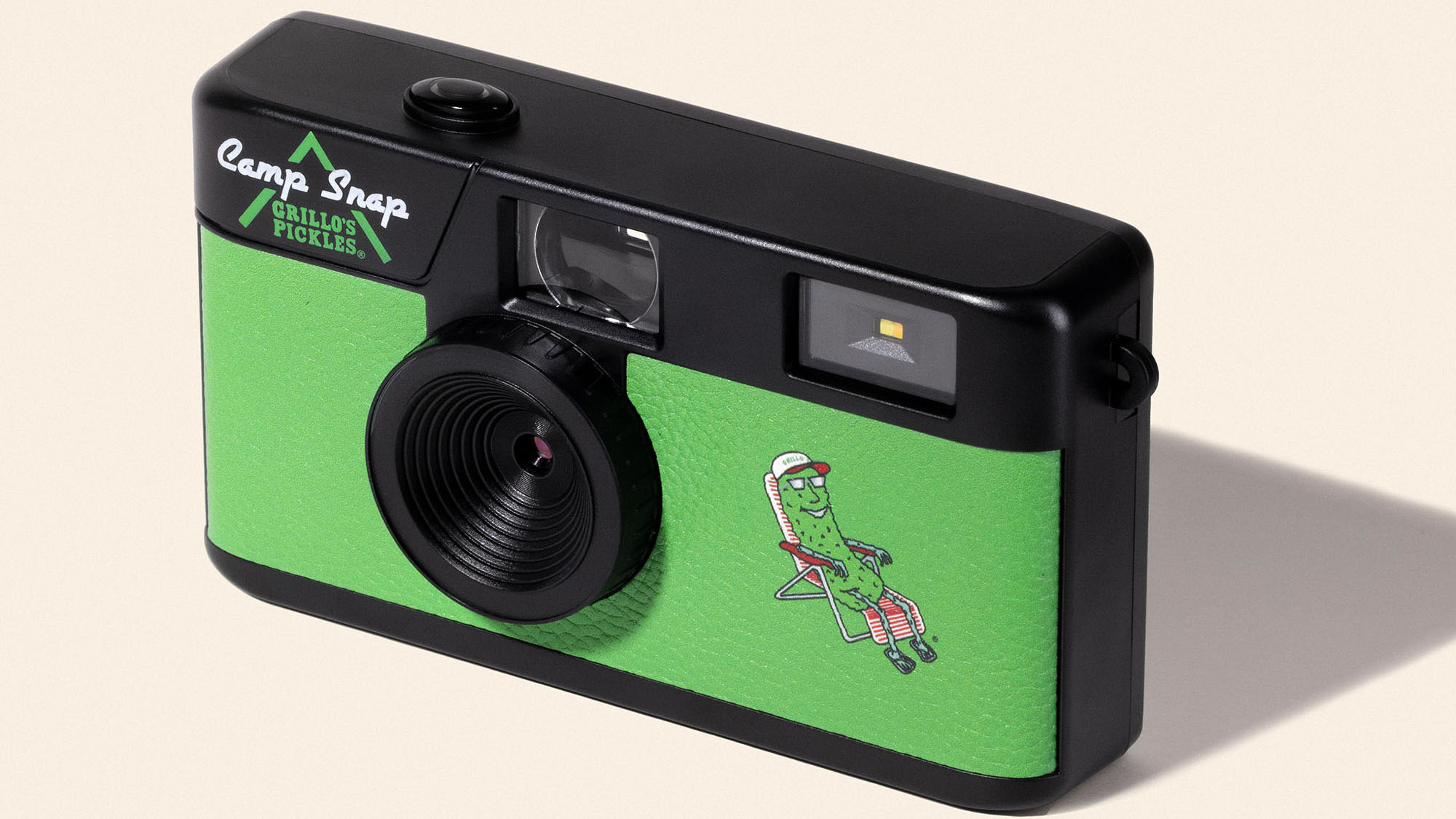 The Camp Snap x Grillo's compact camera is a green pickle-themed camera