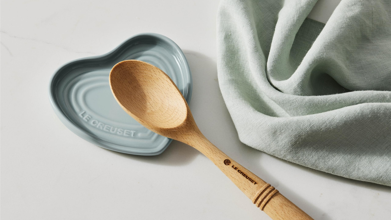 Le Creuset Heart Spoon Rest with a wooden spoon in place