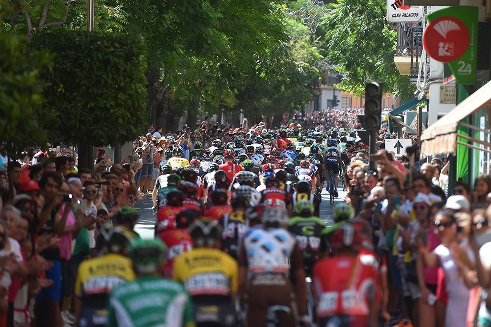 The crowds cheer on the peloton