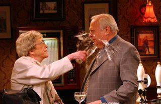 Throwing a drink over undertaker Archie (Roy Hudd) in 2002. Blanche thought he was ‘carrying on’ with Audrey.