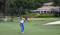 Gregorio de Leo at the top of his backswing