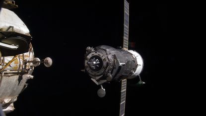 Photo of a Progress spacecraft docking with the ISS