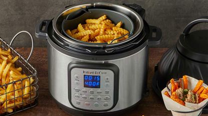 An Instant Pot Duo Crisp + Air Fryer filled with French fries