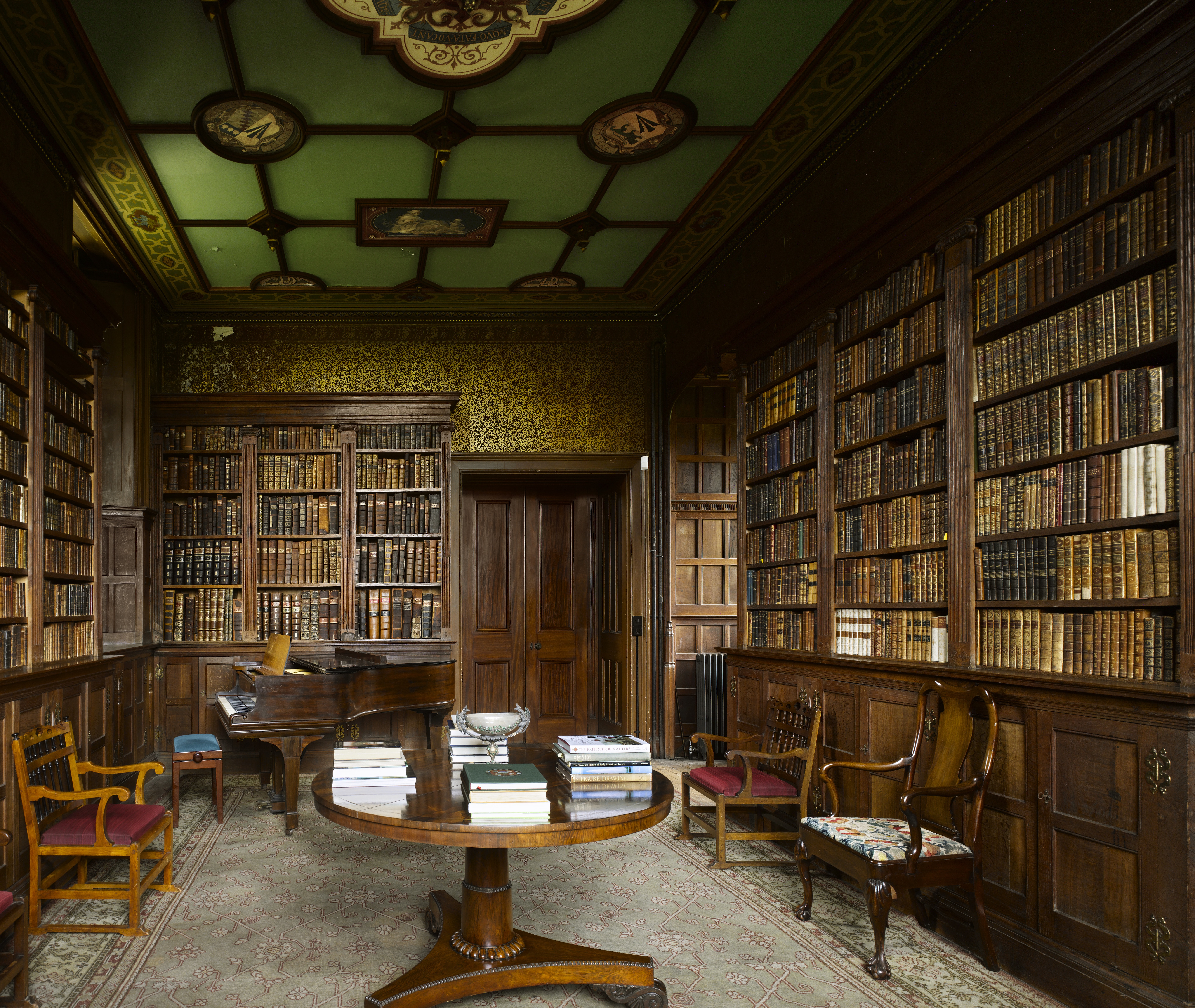 Small library room with green ceiling