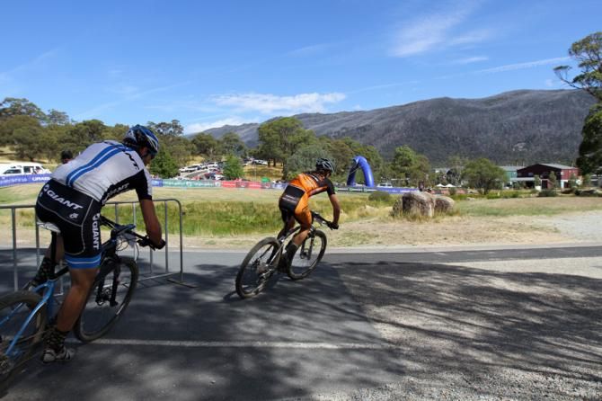 Jack Haig and Paul van der Ploeg head for the finish. Van der Ploeg gets ready to take the sprint finish.