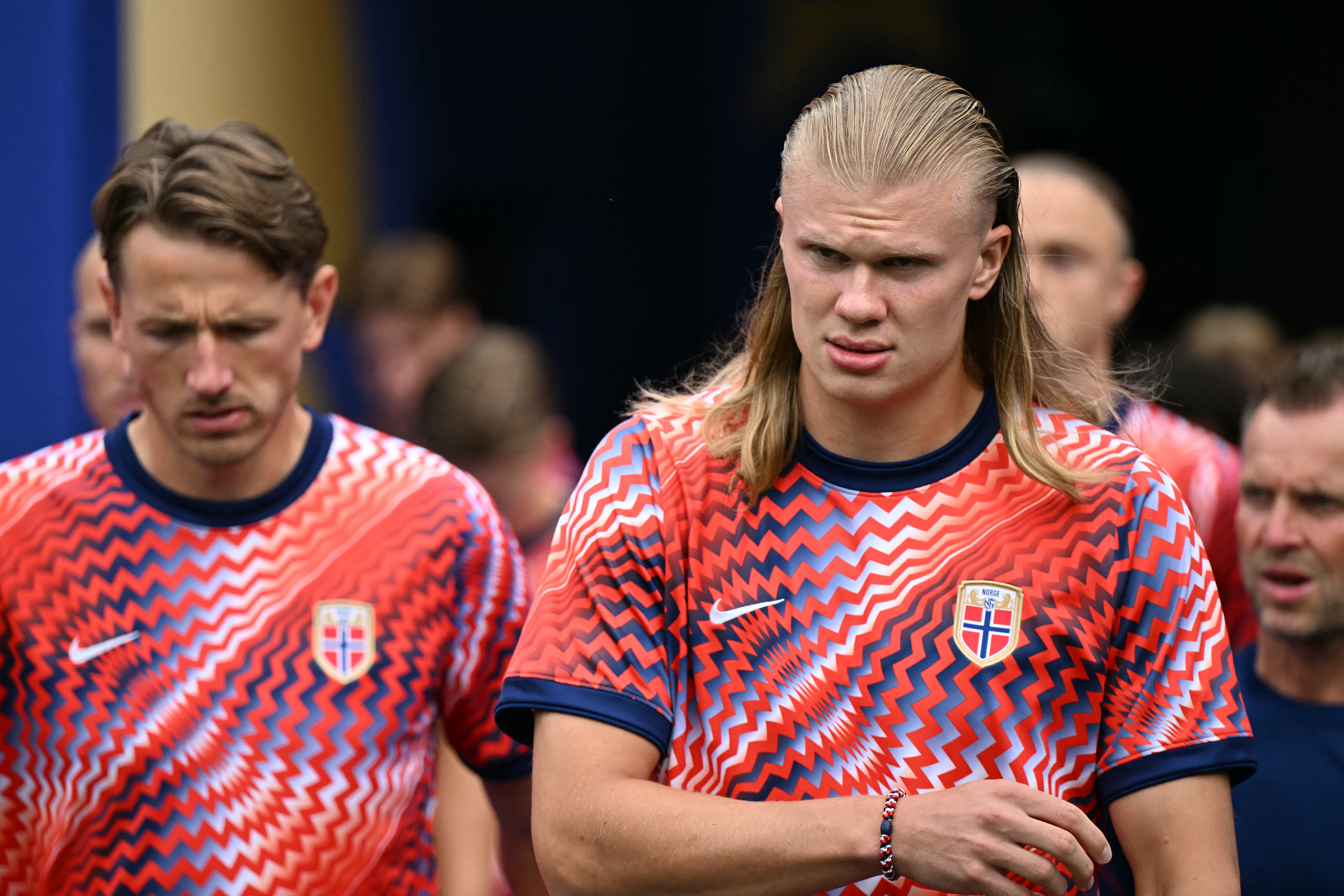 Norway's forward Erling Braut Haaland enters the pitch to take part in the warm-up ahead of the 2026 World Cup Group I football match between Norway and France at the Boston Stadium in Foxborough
