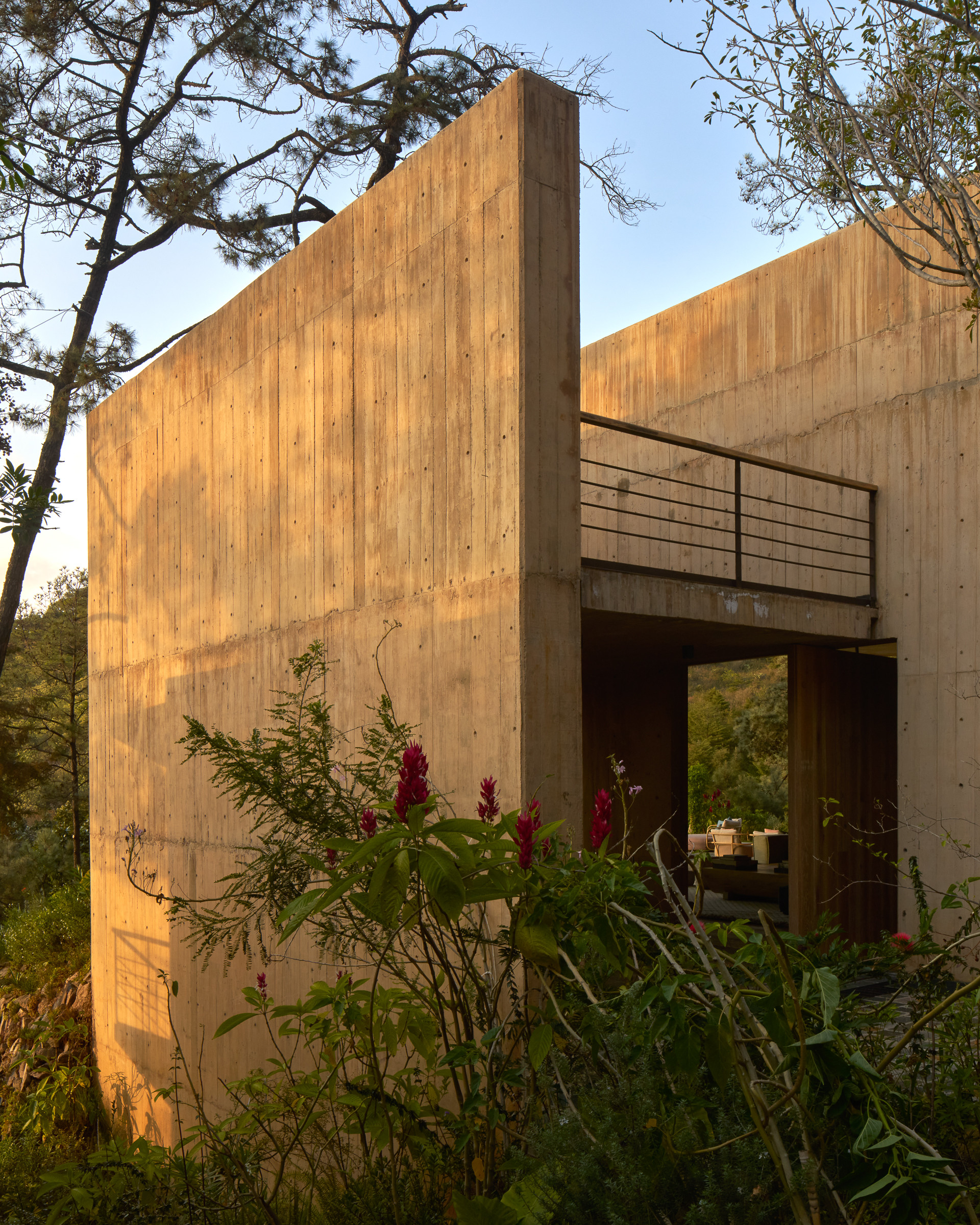 The concrete is pigmented to match the surrounding soil