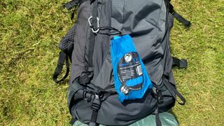 Gear attached to a backpack