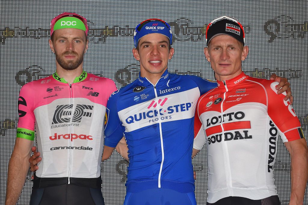 Dan McLay, Alvaro Hodeg and Andre Greipe on the stage podium