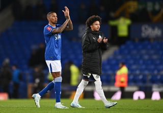 Ashley Young of Everton along with his son, Tyler Young of Peterborough United applaud the fans after the Emirates FA Cup Third Round match between Everton and Peterborough United at Goodison Park on January 09, 2025 in Liverpool, England.