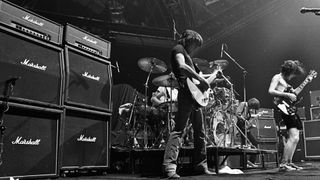 AC/DC performing in 1978 with their customary wall of Marshall Amps