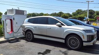Hyundai Ioniq 9 charging at Tesla Supercharger.