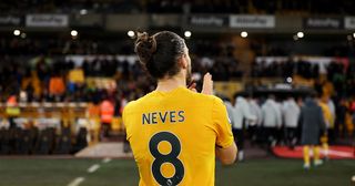 Liverpool target Ruben Neves of Wolverhampton Wanderers shows appreciation to the fans as he walks off the pitch following victory in the Premier League match between Wolverhampton Wanderers and West Ham United at Molineux on January 14, 2023 in Wolverhampton, England.
