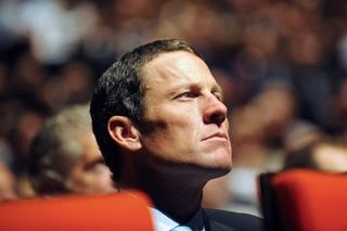 USA's Lance Armstrong (Astana) watches the 2010 Tour de France presentation in Paris