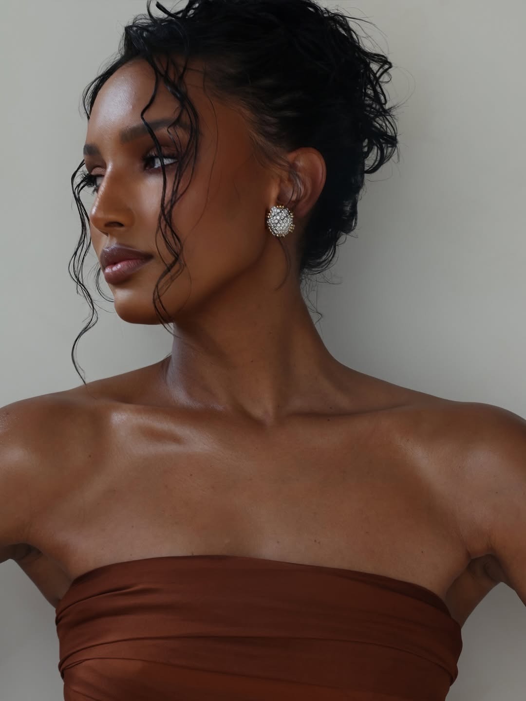 Jasmine Tookes with curled updo