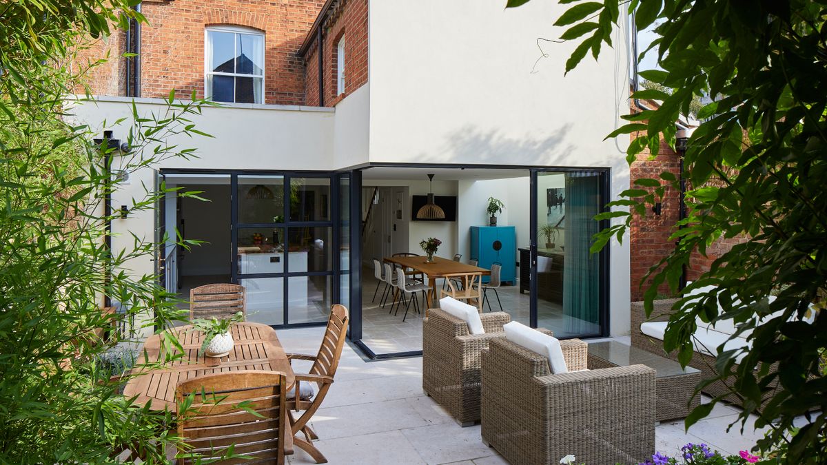 outdoor seating area beside new kitchen extension