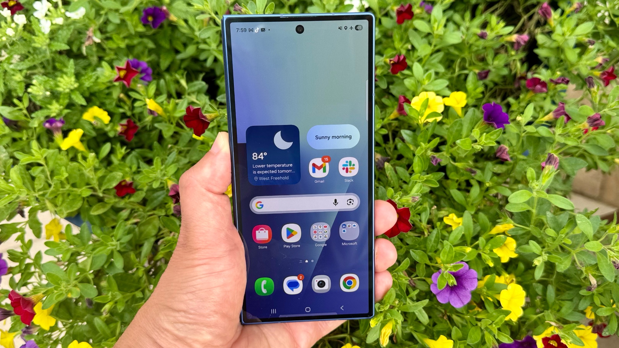 Samsung Galaxy Z Fold 7 in hand showing cover display