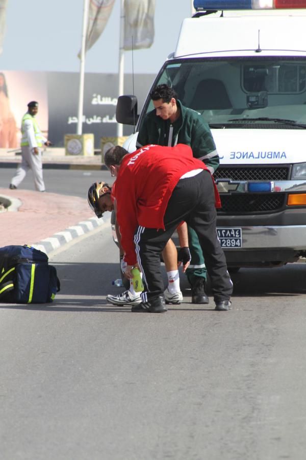A rider gets picked up after a crash