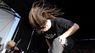 Cannibal Corpse’s George ‘Corpsegrinder’ Fisher headbanging onstage in 2009