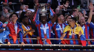 Marc Guehi lifts the FA Cup after Crystal Palace's win over Manchester City in the final in May 2025.