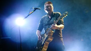 Guitarist Kevin 'Geordie' Walker of Killing Joke performs at Hammersmith Apollo on April 09, 2022 in London, England. 