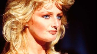 With over a billion streams across YouTube and Spotify, Bonnie Tyler's hair-raising classic Total Eclipse Of The Heart might just be be the biggest power ballad of them all