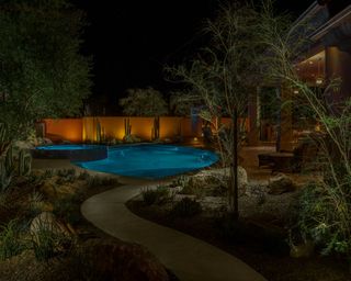 pool lighting ideas on vertical surfaces and fences